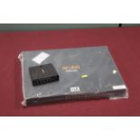 Hewlett Packard Aruba J9779A PoE+ network switch, unused, lacking power cable and a MikroTik PoE