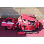 Two first responder's kit bags with some contents to include stethoscopes, blood pressure testers,