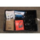 A box containing various headsets SUBJECT TO VAT