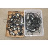 2x boxes containing a quantity of various laptop chargers SUBJECT TO VAT