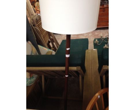 A METAL WOOD EFFECT STANDARD LAMP