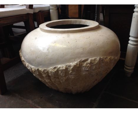 A STONE EFFECT PLANTER DIAM 59CM