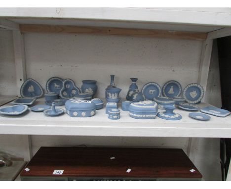 A shelf of Wedgwood blue jasper ware