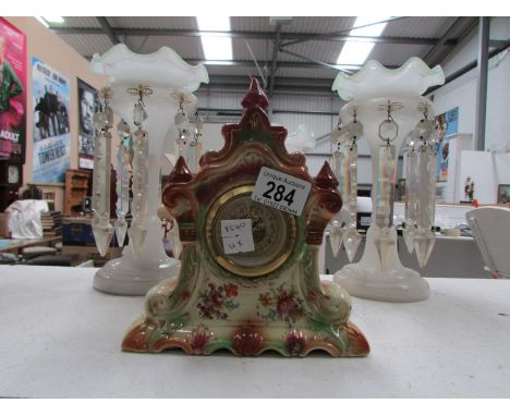 A ceramic mantel clock