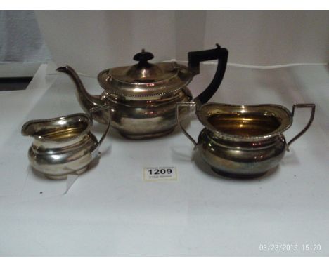 A 3 piece silver tea service, approx. 668gms, Williams (Birmingham) Ltd., 1903