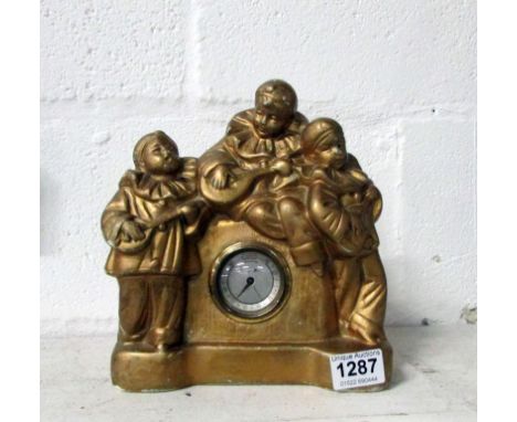 An Art Deco plaster figure thermometer