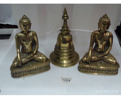2 brass Buddha's and one other item