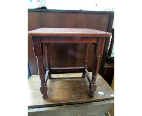 A mahogany stool