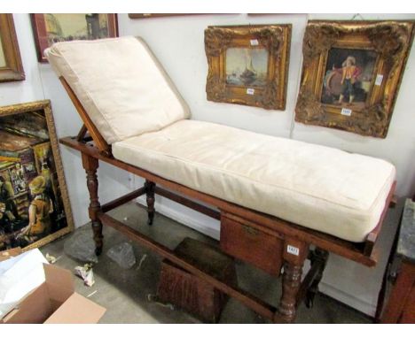 A Victorian doctor's examination couch and stool