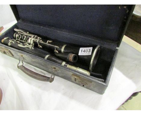 A cased French Cabard clarinet