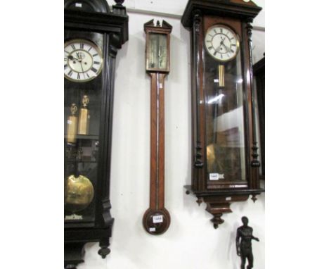 A Victorian inlaid stick barometer by F Molton & Co.