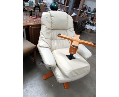 A massage chair and stool