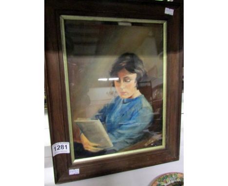 An oil on board portrait of a lady reading signed Nore Finestone