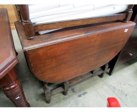 An oak barley twist gate leg table