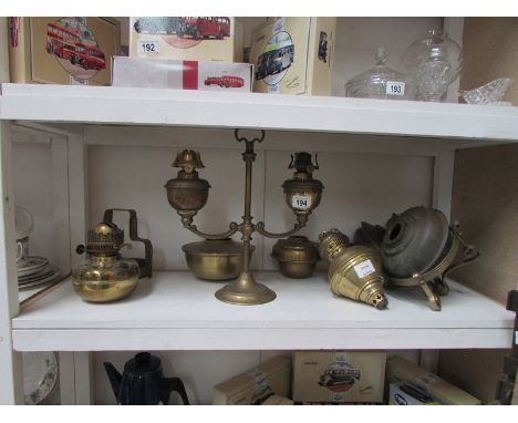 A quantity of brass oil lamp parts