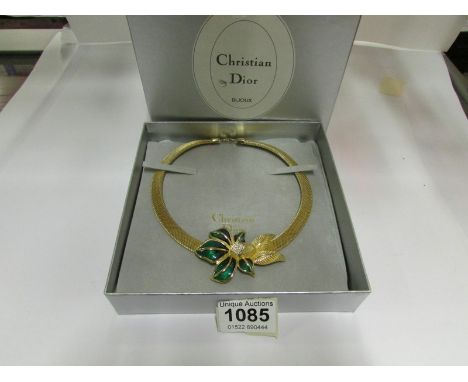 A Christian Dior yellow metal with enamel and paste flower necklace