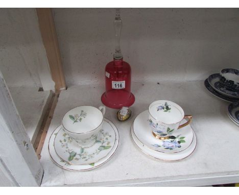 A large cranberry glass bell, 2 trios and an egg trinket box