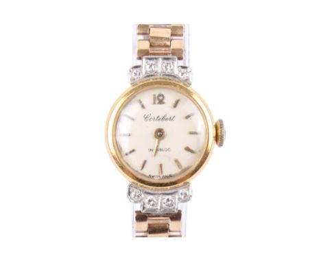 A gold and diamond Cortebert lady's wristwatch. With gilt markers to the cream face, the case hallmarked 18ct to the side of 
