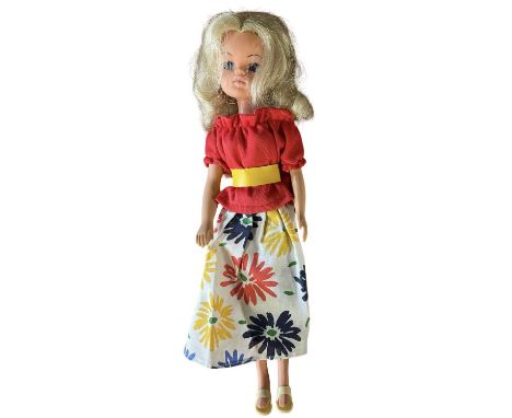 Carnival Girl Sindy (Pedigree, 1985)In white floral skirt and red blouse with yellow belt and white sandals