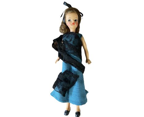 Tammy doll (Ideal Toys, 1964)Marked to rear of head BS-12In teal dress with black netted scarf, black hair bow and black shoe