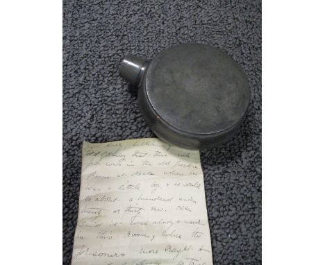 A late 18th century pewter flask, the circular flattened body stamped L & R Merry Dublin, 12.5cm high, with provenance note d