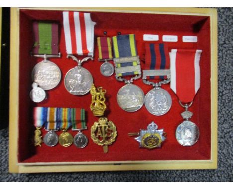 A group of medals relating to the Straker family, to include a Punjab medal to Supg Surgeon C D Straker, with two bars Moolta