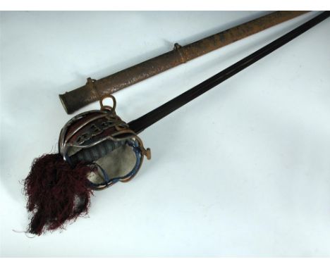 A Victorian Scottish basket hilt sword, standard pattern with steel basket and liner, the etched blade by Henry Wilkinson and