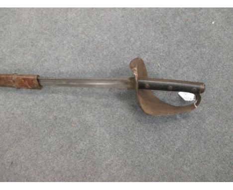 A British 1899 cavalry trooper's sword, by Wilkinson, London, the back of the blade stamped L99 Crown over 49 over W, chequer