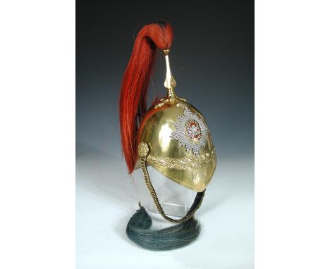 A 3rd Dragoon guard brass helmet, with two plumes including 5th Lancers, enamel badge with Prince of Wales feathers, together