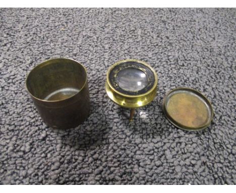 A pocket aneroid barometer with moving bezel, by J. Halden & Co. Ltd., Manchester, together with a homemade giro compass, the