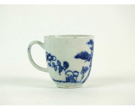 A Bow porcelain blue and white coffee cup circa 1755, painted with a pine tree, roots and grass, unmarked, 5.8cm high