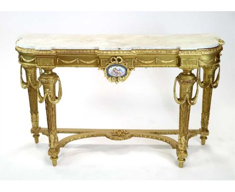 A decorative 19th century gilt carved wood and moulded plaster marble-topped console table, the shaped rounded rectangular fl