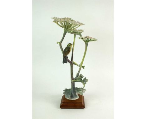 A Royal Worcester model of a Chiff Chaff and Hogweed designed by Dorothy Doughty with circular wooden base, printed factory m