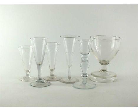 A group of six eighteenth and nineteenth-century drinking glasses including a large rummer, a ratafia flute, wrythen ale, dwa