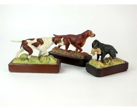 Three Royal Worcester models of Sporting Dogs by Doris Lindner comprising 'Cocker Spaniel', 'English Pointer' and 'Irish Sett