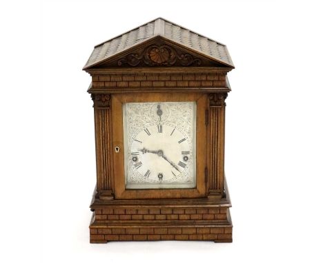 A 19th century German rosewood cased architectural bracket clock, the engraved silvered dial with black Roman numerals with i
