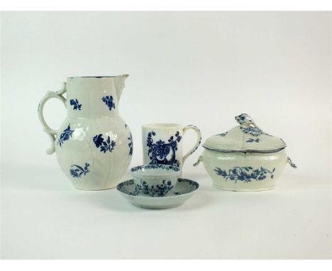 A group of 18th/early 19th century English blue and white porcelain comprising a Worcester mask head jug, Worcester tea bowl 