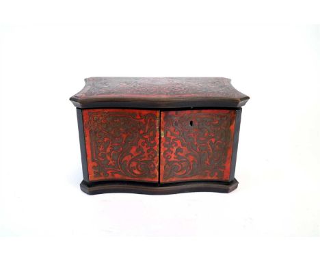 A 19th century inlaid boulle work tea caddy, of rectangular form, the hinged top with a serpentine front opening to reveal tw