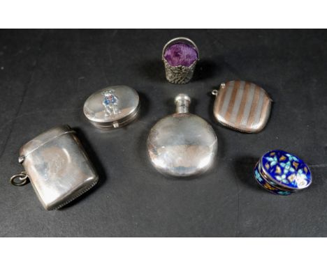 A small group of silver items, comprising two vesta cases, a miniature flask, an oval pill box with teddy bear to the cover, 