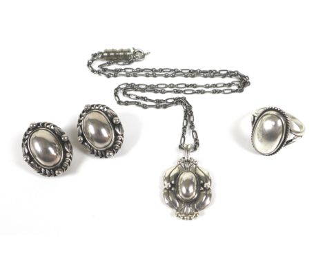 A collection of Georg Jensen jewellery, including a sterling silver Pendant of the Year 2000 necklace, pendant 3.2 by 2cm, bo