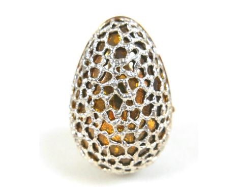 A Stuart Devlin silver gilt 'Surprise' egg, the outer overlaid surface with plain band to middle, opening to reveal a hedgeho