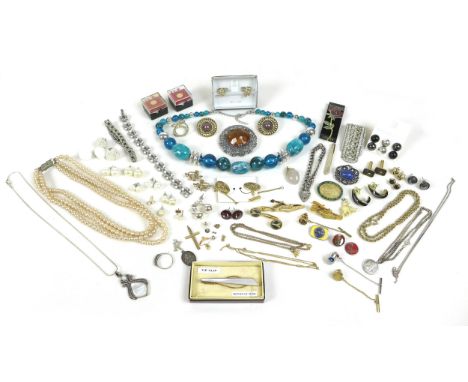 A collection of costume jewellery, including brooches, necklaces, cufflinks, and a mother of pearl set tie clip. (1 bag) 