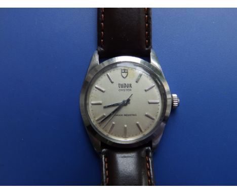 A gent's stainless steel Tudor Oyster wrist watch, the silvered dial with silver baton markers, case diameter 35mm, the leath