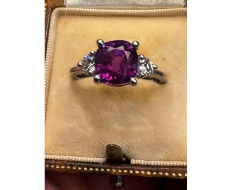 A certified natural 3.2 carat Sri-Lankan vivid pinkish purple colour change sapphire &amp; diamond ring, the four-claw set sq