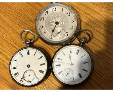 A silver key wind pocket watch with lever escapement, silver dial, Chester marks for 1898 and two white enamel dial silver po