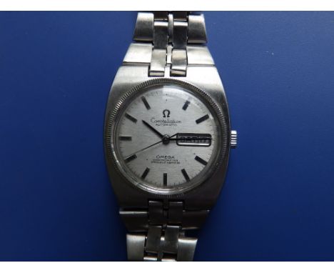 A gent's stainless steel Omega Constellation Automatic Chronometer Day/Date  bracelet wrist watch, the silvered dial missing 