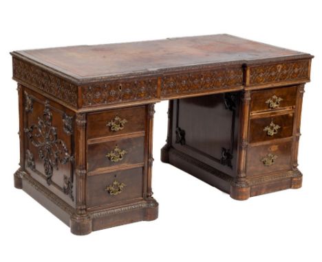 An extremely fine 19th Century mahogany pedestal Desk, in the Chippendale Revival style, the crossbanded rectangular top with