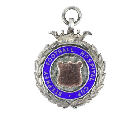 Medal: Soccer - 1930-31, a circular silver Medal, with crown surmounted and with enamel rim inscribed 'Stepney Football Hospi
