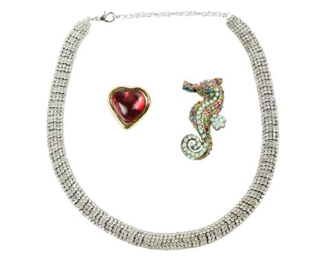 Jewellery: An attractive Yves St. Laurent Ladies heart shaped Brooch, with ruby coloured centre, stamped, with pin clasp; an 