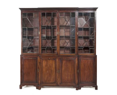 A fine quality George III mahogany Bookcase, the shallow moulded cornice with Greek key fret frieze above four astragal glaze